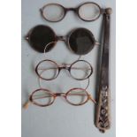 Three pairs of faux tortoiseshell and rolled gold spectacles circa 1920s, one fitted with tinted