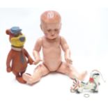 Three dolls and figures comprising Moko diecast Muffin The Mule puppet, bendy Yogi bear and a