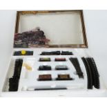 Mainline 00 gauge train set with BR 4-6-0 locomotive, six wagons , tankers and vans and an