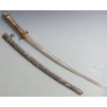 Japanese WW2 Shin Gunto Samurai sword with shagreen handle, ornate embossed and gilt fittings and