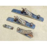 Four woodworking planes comprising Record nos 4, 6 and 7 and a small plane marked no 66