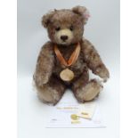 Steiff Danbury Mint limited edition 2009 Teddy bear with tipped mohair growler and medal, 30cm tall,