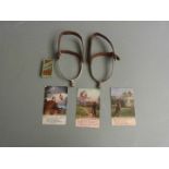 WW1 era 'The Trail That Leads to Home' postcards, a pair of cavalry stirrups by Stallwood