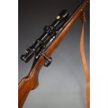 BRNO Model 2 .22 bolt-action rifle with chequered semi-pistol grip, magazine, leather sling,