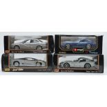 Four 1:18 scale diecast model vehicles Maisto Special Edition Dodge Viper GT2, Jaguar XJ220 and