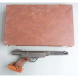 Original Model 10 .177 target air pistol with adjustable wooden grips, trigger and sights, serial