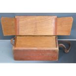 Target shooter's wooden range box with fitted interior and leather shoulder strap, 50 x 25 x 20cm.