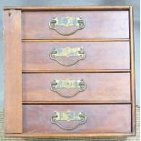 Mahogany four drawer Wellington style collectors cabinet with brass drop handles, 31x31x26cm.