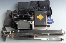 Gandolphi half plate camera with ebonised finish and chrome fittings, together with a Schneider-