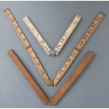 Three folding rulers comprising one faux ivory by WM Marples & Sons and two boxwood with brass