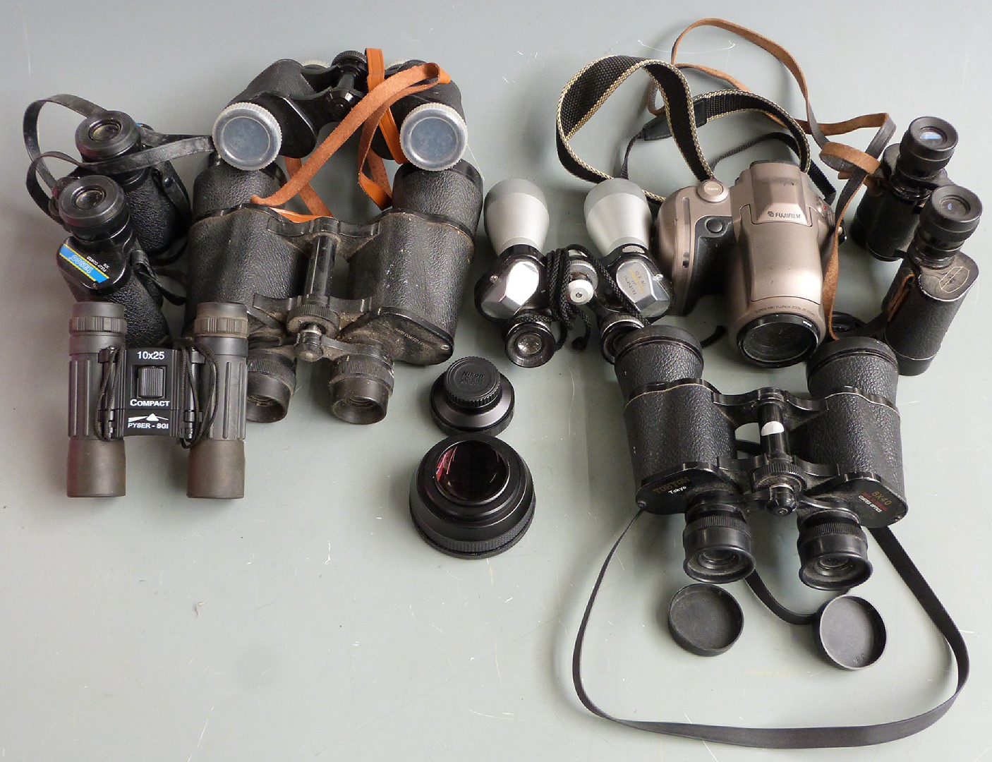 Five pairs of binoculars comprising Simor 10x40, Minerva 8x30, Tasco 8x30, Prinz 8x30 and Tohyoh