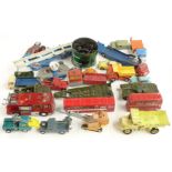 Twenty-three Corgi Toys and Dinky Toys diecast model vehicles including Mighty Antar Tank