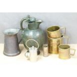 A bronze/brass patinated jug, measures etc, tallest 25cm