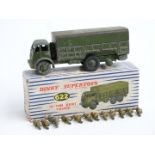 Dinky Supertoys diecast model 10-Ton Army Truck with green cab, back and cover, driver and 11