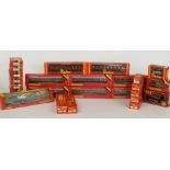 Twenty-six Hornby and Tri-ang 00 gauge model railway coaches, wagons and vans, all in original