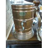 A copper 'Gem Still' water purifier, Jardiniere brass jug, large brass jam pan, large copper