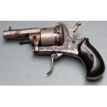 7mm six-shot double action pinfire revolver with folding trigger, shaped wooden grips and 2.25