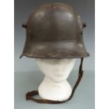 German WW1 M16 steel helmet with padded liner and leather chin strap