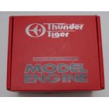 Thunder Tiger GP42 model aircraft glow engine in box, together with a GP7 engine and an Irvine 25