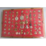 Sixty seven mainly British Army badges including Gloucestershire Regiment, Argyll & Sutherland