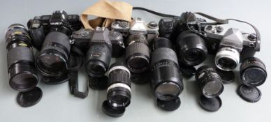 Five SLR cameras and various lenses, comprising Minolta 7000 with Cosina 28-210mm 1:3.5-5.6 lens,