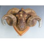 Taxidermy study of a Shetland ram with pewter mounts, probably regimental, engraved JF and JE to