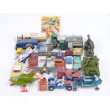 Twenty-four Dinky Toys and Dinky Supertoys diecast model vehicles including Ever Ready Batteries Guy