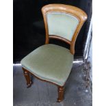 Set of six Victorian dining chairs with reeded front legs raised on castors