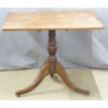 A 19thC oak tilt top table raised on a turned support and tripod base, W89 x D78 x H74cm