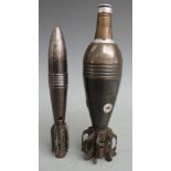 Two French mortar bombs, largest dated 1947 and 24cm tall