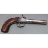 Large approximately 13 bore percussion hammer action coat pistol with carved shaped wooden grip,