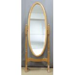 An oval pine cheval mirror, H160cm