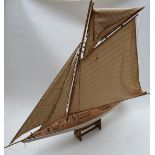 A fully rigged wooden model pond yacht, L105 x H105