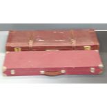 Two shotgun carry cases both with fitted interiors one with a section for a second set of barrels,