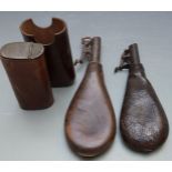 Two leather shot flasks, one with embossed markings, largest 22.5cm long, together with a leather