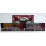 Three Road Signature 1:18 scale diecast model vehicles comprising two Deluxe Edition 1947 MG TC