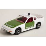 Corgi Toys diecast model Porsche 924 police car with white and green body and red interior, 430,
