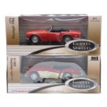 Two ERTL Grandes Marques 1:18 scale diecast model cars Austin-Healey 100/6 33838 and Triumph TR6