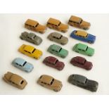 Fifteen Dinky Toys diecast model cars including Studebaker, Austin Somerset, Morris Oxford, Ford