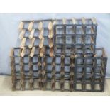 Five wine racks, would accommodate 57 bottles, largest 43 x 42cm