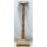 A 19thC mahogany jardiniere stand with rope twist support and carved base, H 123cm