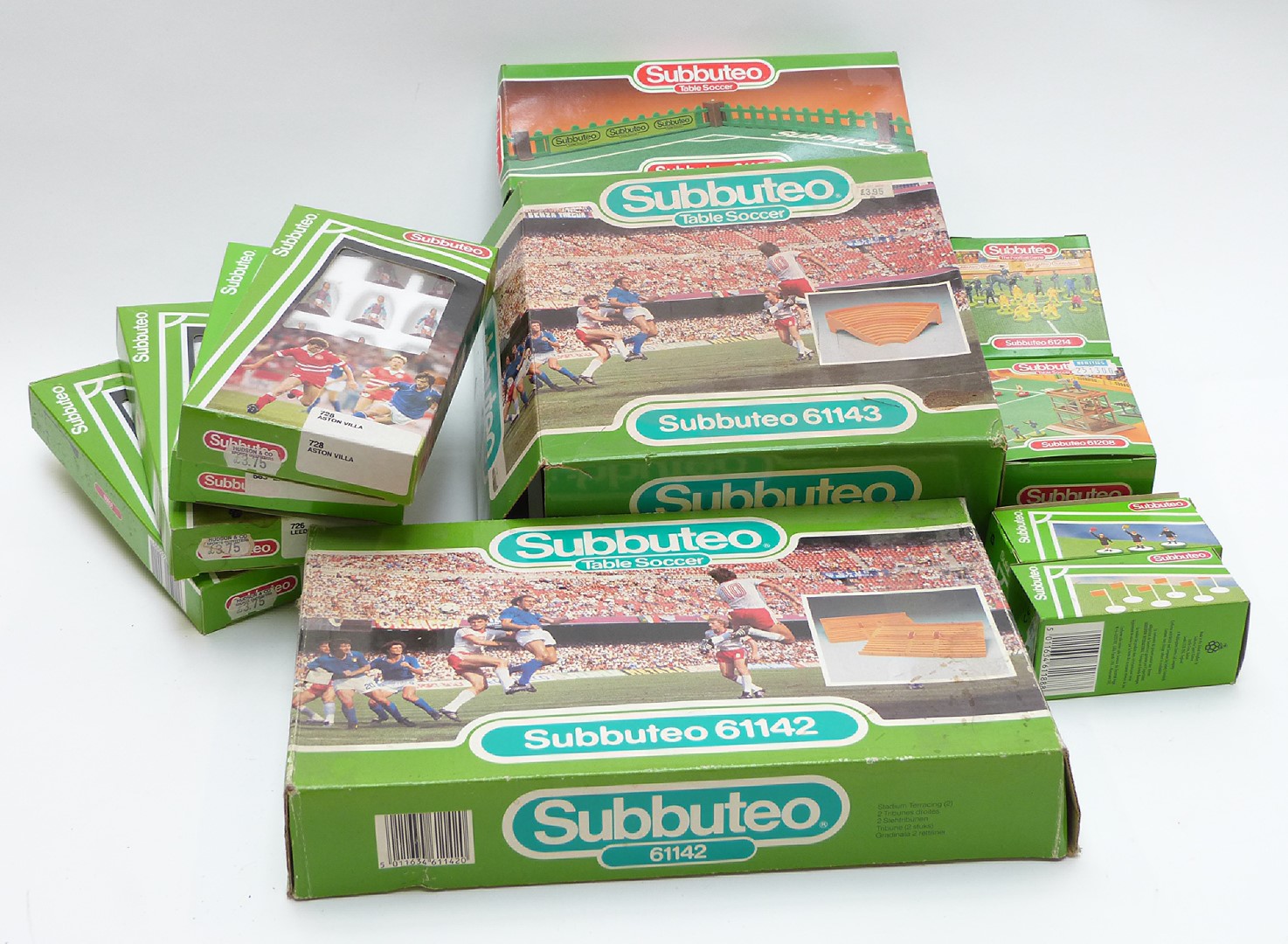 Eleven Subbuteo table soccer teams and accessories including Liverpool, Manchester City, Leeds