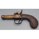 Belgian brass percussion hammer action pocket pistol with engraved lock and trigger guard, chequered