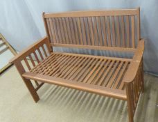A teak or similar hardwood garden or conservatory bench, W126 x D60 x H 90cm