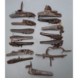 Thirteen percussion and flintlock gun locks including some pairs mostly named including George