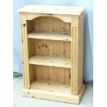 A contemporary pine bookcase, W61 x D27 x H92cm