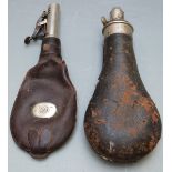 Sykes leather covered metal powder flask together with a leather shot flask, largest 21cm long.