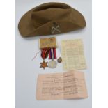 Two WW2 medals in original box awarded to private RHW Daniels, Gloucestershire Regiment, probably no