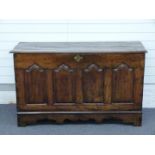 An 18thC panelled oak coffer, W138 x D53 x H81cm