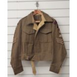 British Army WW2 battledress tunic with Royal Artillery insignia and Staff Sergeant rank to